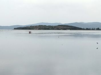 Titolo: Boating with fishermen at Lake Trasimeno