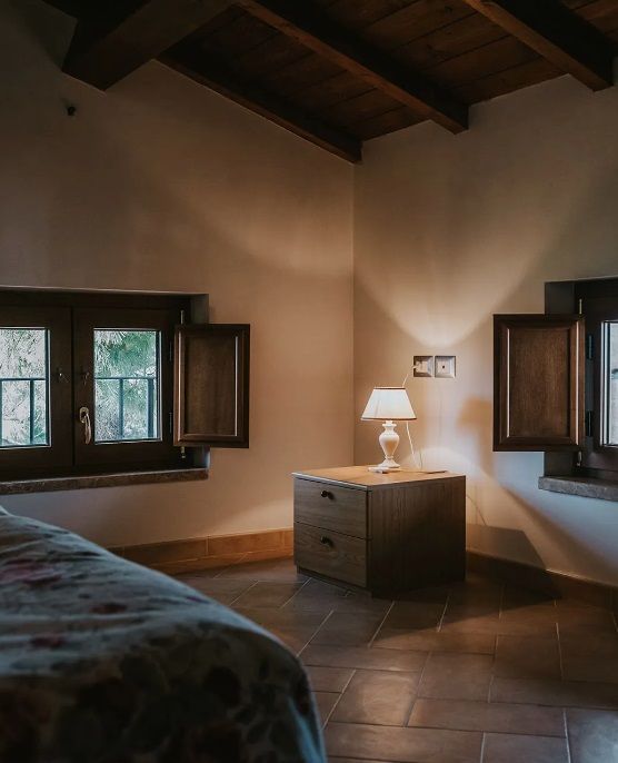 A rustic agriturismo room perfect for a peaceful stay in nature.
