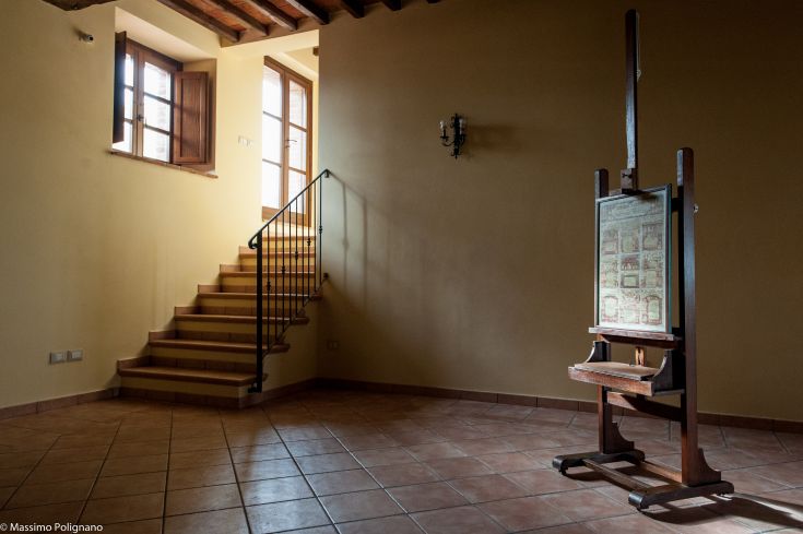 A bright interior featuring stairs and windows, creating a comfortable and inspiring atmosphere.