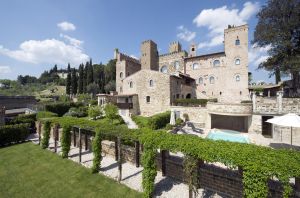 A historic building set in the Umbrian landscape, blending ancient architecture with modern life.