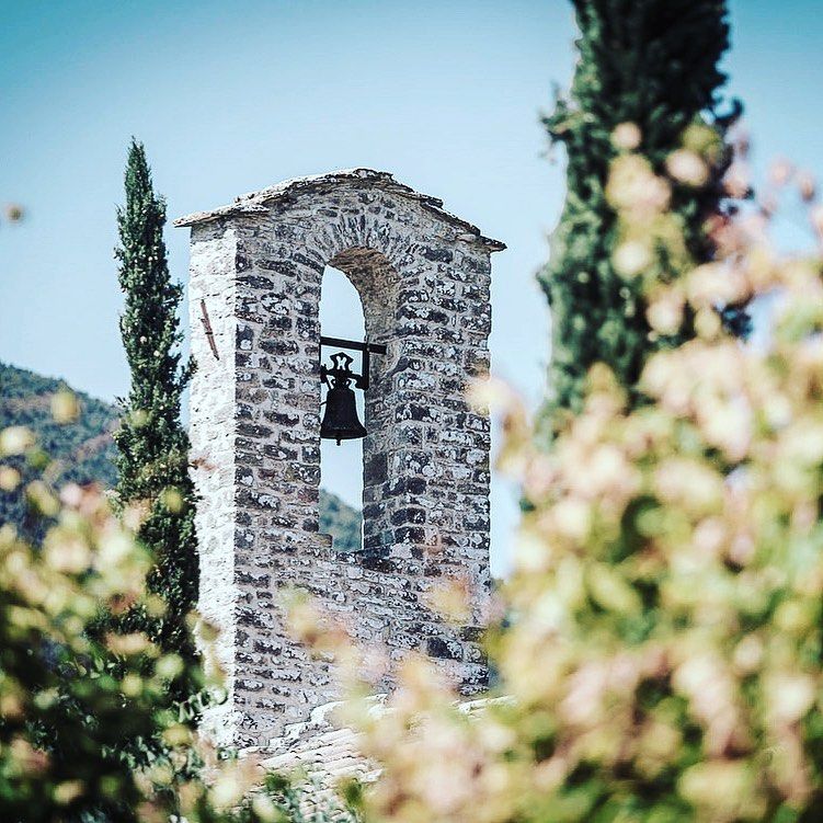 The Church of the Carmine, located in a picturesque Umbrian setting, offers a serene place with beautiful views.