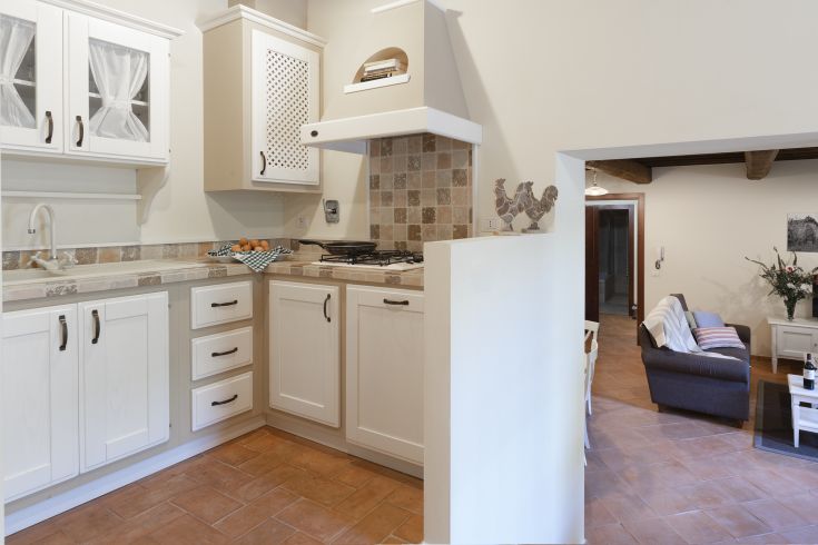 Well-furnished and functional kitchen space, ideal for preparing meals during a relaxing stay.