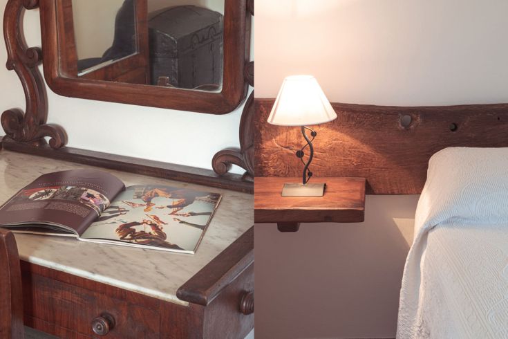 Interno di una camera caratterizzata da mobili in legno e un'illuminazione morbida.