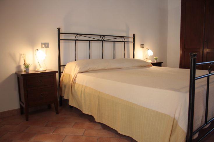 Comfortable bedroom with a double bed and understated decor.