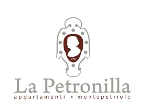 Surrounded by trees, La Petronilla apartments offer a cozy stay in the Umbrian countryside.