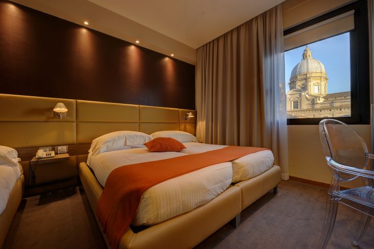 Room of Dal Moro Gallery Hotel, featuring modern comforts and a panoramic view of the dome.