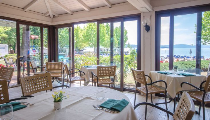 A restaurant located near Lake Trasimeno, perfect for a peaceful lunch with a view of the lake.