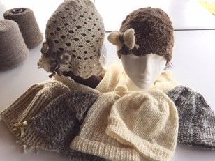 Knitted and crocheted winter hats suitable for cold weather, displayed on a light background.