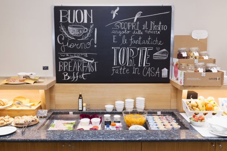 Buffet breakfast featuring homemade pastries and a selection of fresh products.