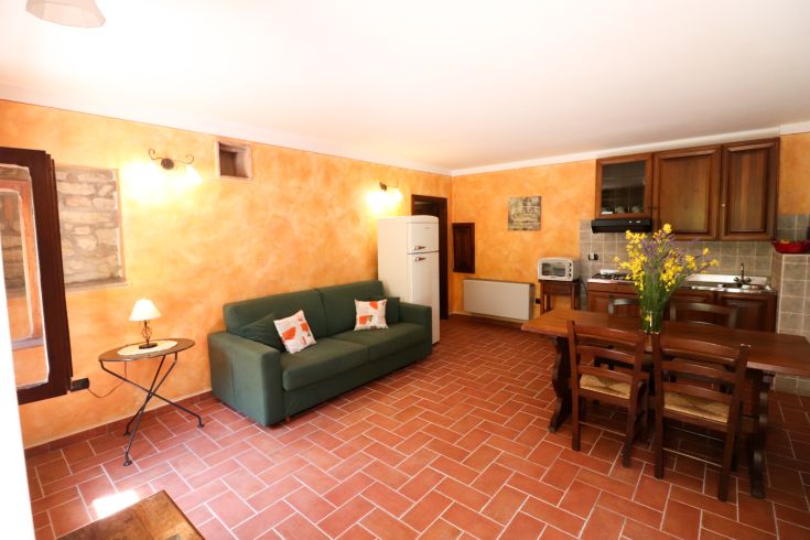 Gemütliches Apartment in einem Agriturismo, mit Terrasse und ausgestatteter Küche, in einer naturnahen Umgebung.