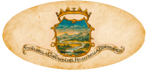 Stemma della Tenuta di Biscina, circondato da colline verdi, rappresenta un luogo di calma in Umbria.