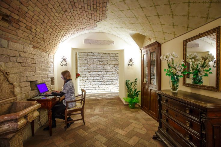 Inside a hotel featuring historical details and modern comforts, creating a relaxing atmosphere.