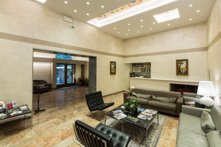 Ambiente piacevole con arredi semplici e dettagli curati, ideale per momenti di relax.