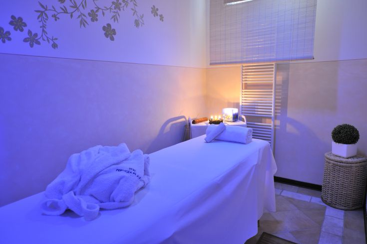 A relaxing environment with soft lighting and wellness equipment.