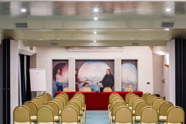 Well-equipped meeting room ready to host participants for discussions and meetings.