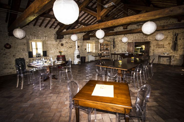 Interior of an ancient palace, featuring minimalist furniture and modern lighting.