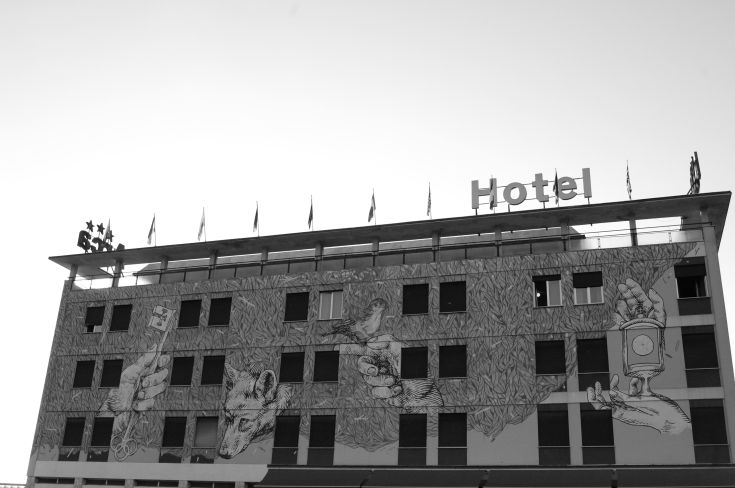 Hotel Arca features a street art mural and a cozy atmosphere.