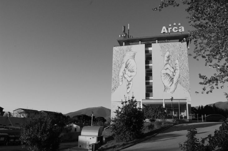 Hotel Arca, centrally located, features a street art mural that creates a calm and welcoming atmosphere.