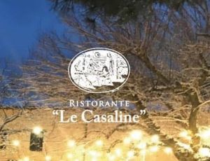Un ristorante con un'atmosfera calda, illuminato da luci delicate, ideale per un pranzo invernale.