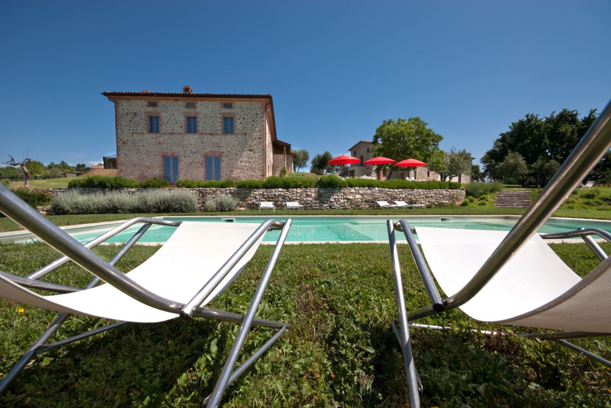 An agritourism facility located in the peaceful Umbrian countryside, featuring a pool for relaxation.