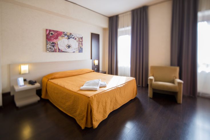 Cozy and simple room at Hotel Valentino, ideal for a stopover during your stay in Terni.