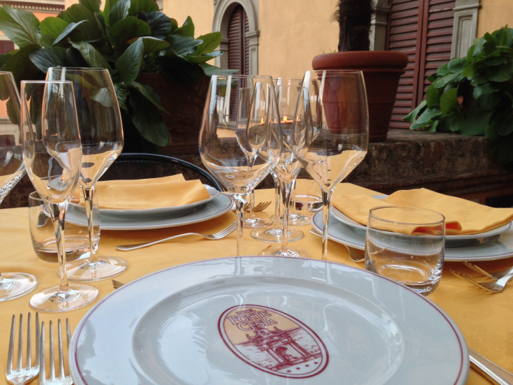 Well-set table for a restaurant lunch, featuring simple details and a pleasant atmosphere.