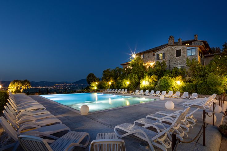 Relaxing moments by the pool surrounded by the tranquility of the Umbrian hills.