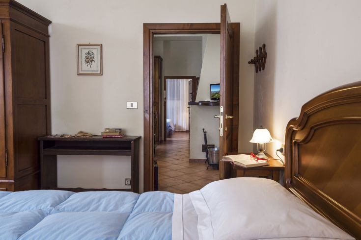 Ambiente accogliente con spazi interconnessi, adatto per momenti di relax.