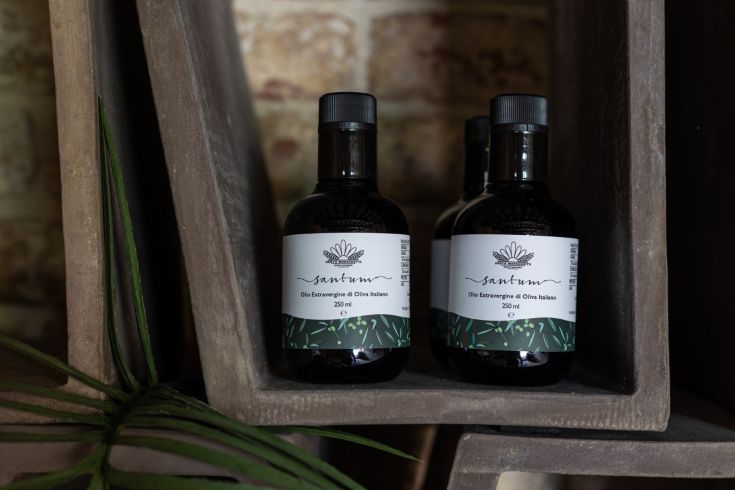 Extra virgin olive oil in elegant bottles, perfect for enhancing the flavor of various dishes.