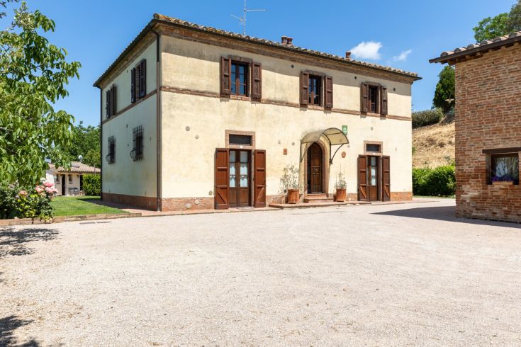 Renovated farmhouse among olive groves, located in a peaceful area of the Umbrian countryside.