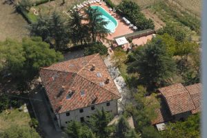 Countryside agriturismo with a pool, nestled in the Umbrian hills, providing a peaceful and natural setting.