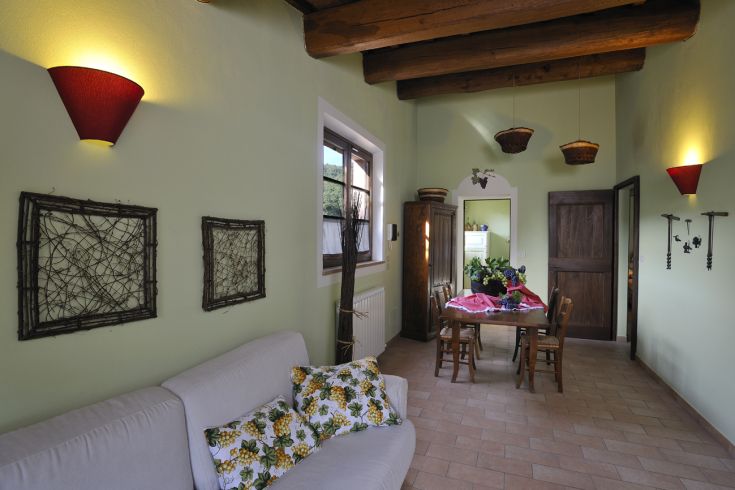 A simple and cozy space with rustic elements, perfect for relaxing and spending time together.