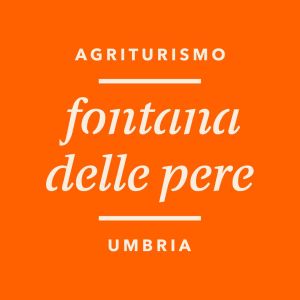 Un agriturismo paisible en Ombrie, entouré d'oliveraies et de champs verdoyants, idéal pour une escapade relaxante.