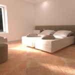 Gut gepflegtes Zimmer mit bequemen Betten und natürlichem Licht.