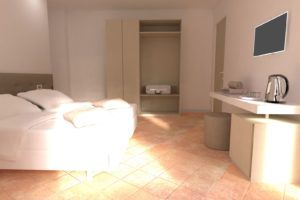 Intimer und komfortabler Raum mit einem Doppelbett und einfachen Dekorationen.