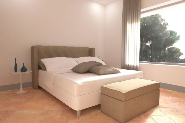 Moderne Schlafzimmer mit einem Doppelbett, ausgestattet mit großen Fenstern, die auf einen Garten mit Bäumen blicken.