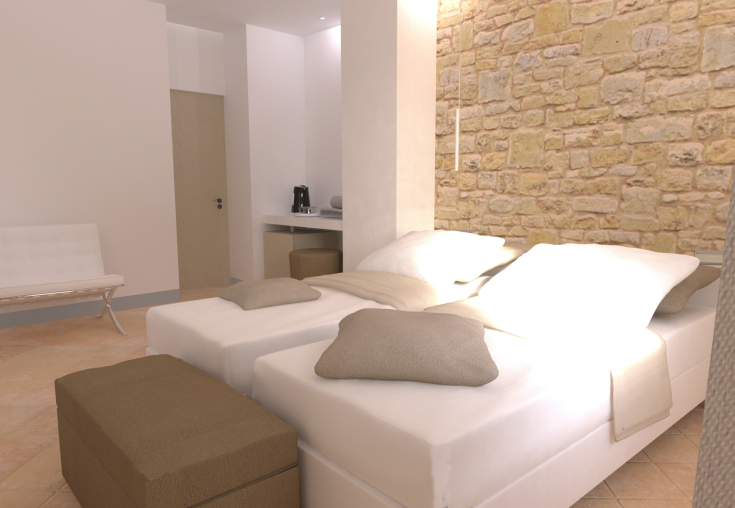 Gemütliches Schlafzimmer mit Steinwand und bequemen Betten, einfache und einladende Atmosphäre.