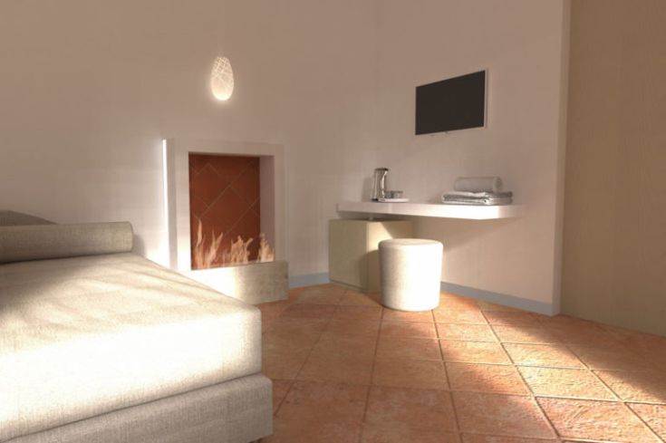 Innenansicht eines Hauses mit einem Sofa, einem Kamin und einem Fernseher, das eine einfache und gemütliche Atmosphäre erzeugt.