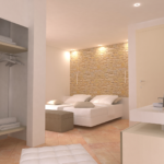 Schlichtes Zimmerinnere mit Betten und warmem Licht, das eine einladende Atmosphäre schafft.