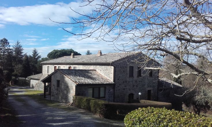 A renovated countryside farmhouse, surrounded by a park and features a swimming pool, located in Umbria.