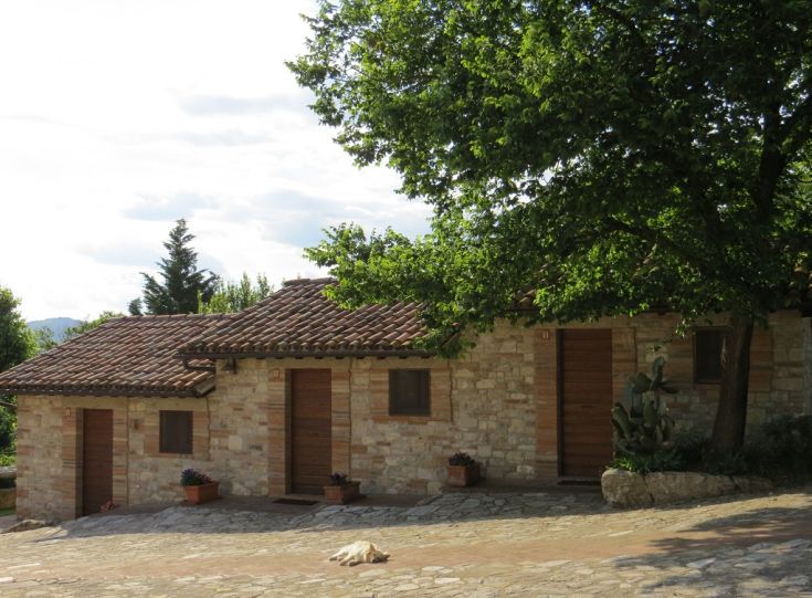 A charming agriturismo in the Umbrian countryside with cozy rooms and a serene wellness center.