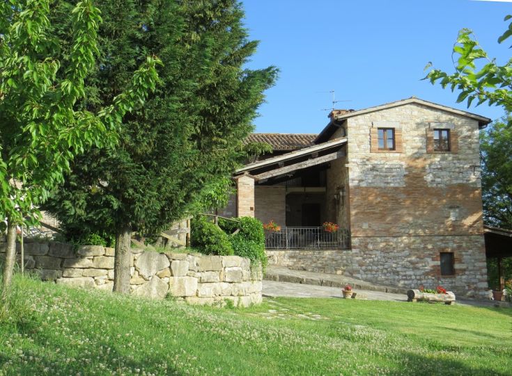 A historic palace surrounded by lush greenery, perfect for a tranquil getaway with a swimming pool.