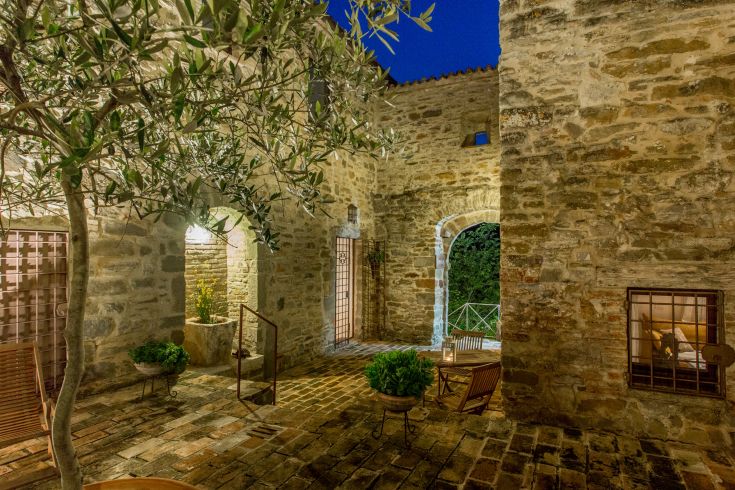 Historic monastery with simple apartments and a well-kept garden, located in the Umbrian countryside.