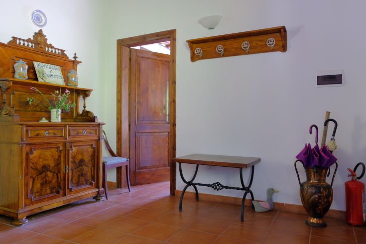 Cozy interior with wooden furniture and a simple design, ideal for relaxation.