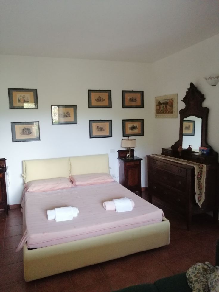 Cozy room with wooden furniture, perfect for moments of tranquility.