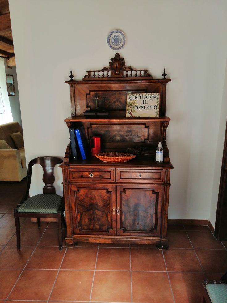 Classic wooden furniture with simple details, creating a warm and inviting atmosphere.