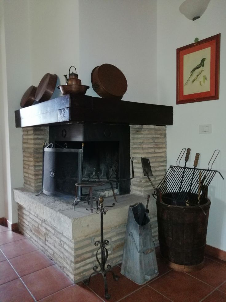 A cozy path in a comfortable setting, furnished with tools and everyday objects.