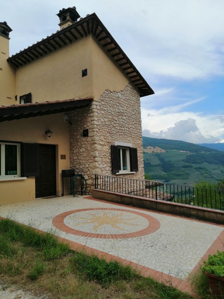 An agricultural activity in an ancient stone farmhouse, surrounded by olive trees in the peaceful Valnerina.