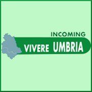 Logo colorato che simboleggia il progetto Vivere Umbria, focalizzato sul turismo in questa regione.