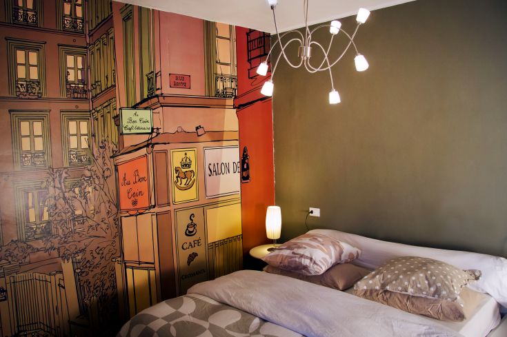 Simple room with wall decorations, perfect for a peaceful stay.